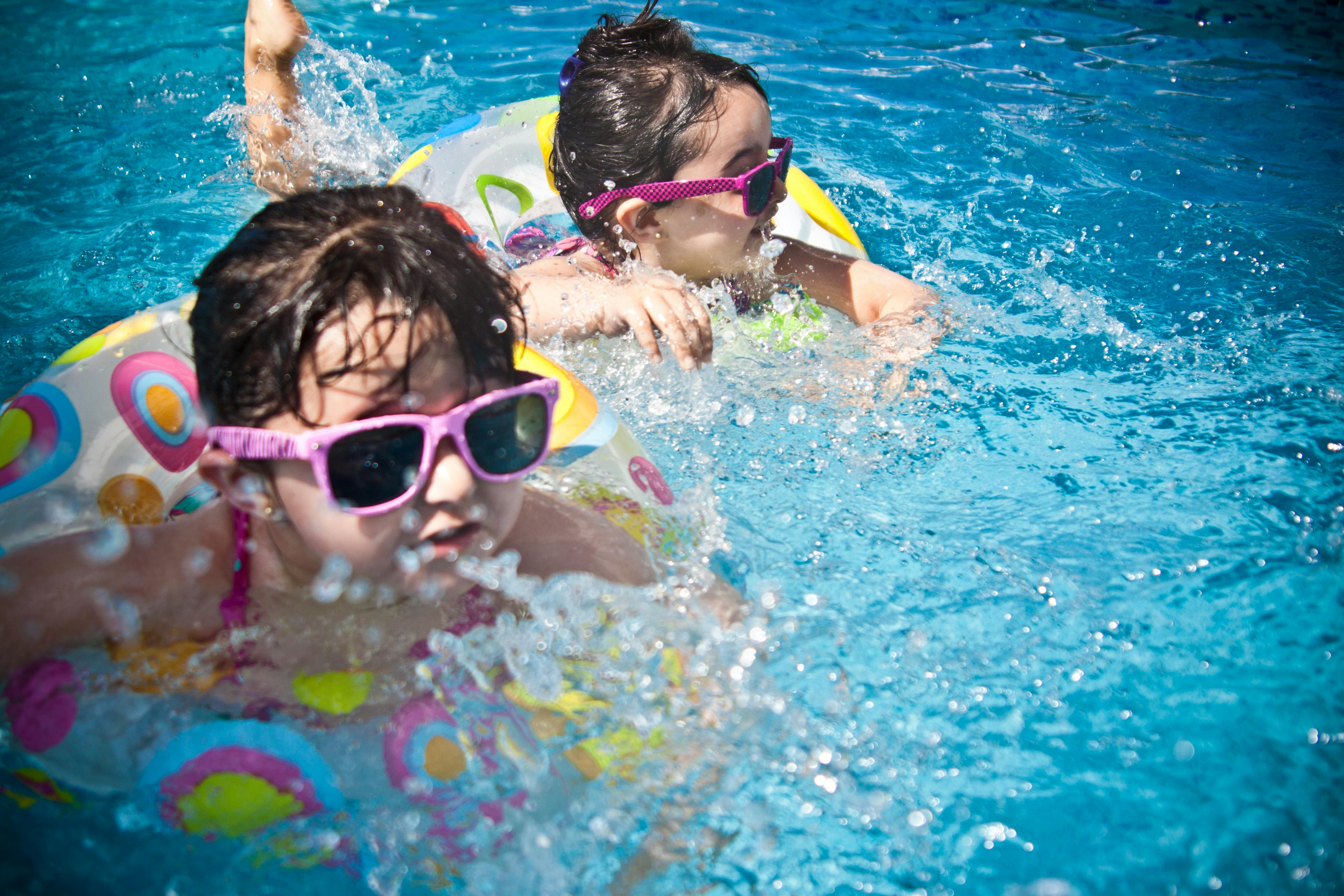 Child swimming in pool